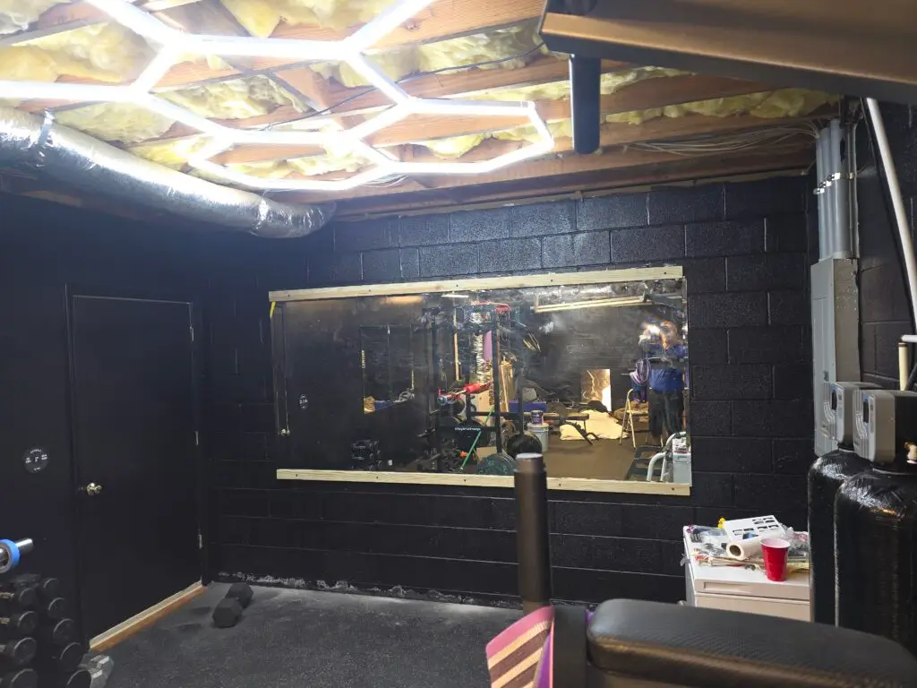Mirror and Lighting Installation in Locust — custom wooden supports