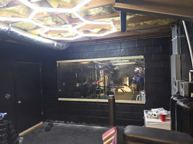Mirror and Lighting Installation in Locust — custom wooden supports